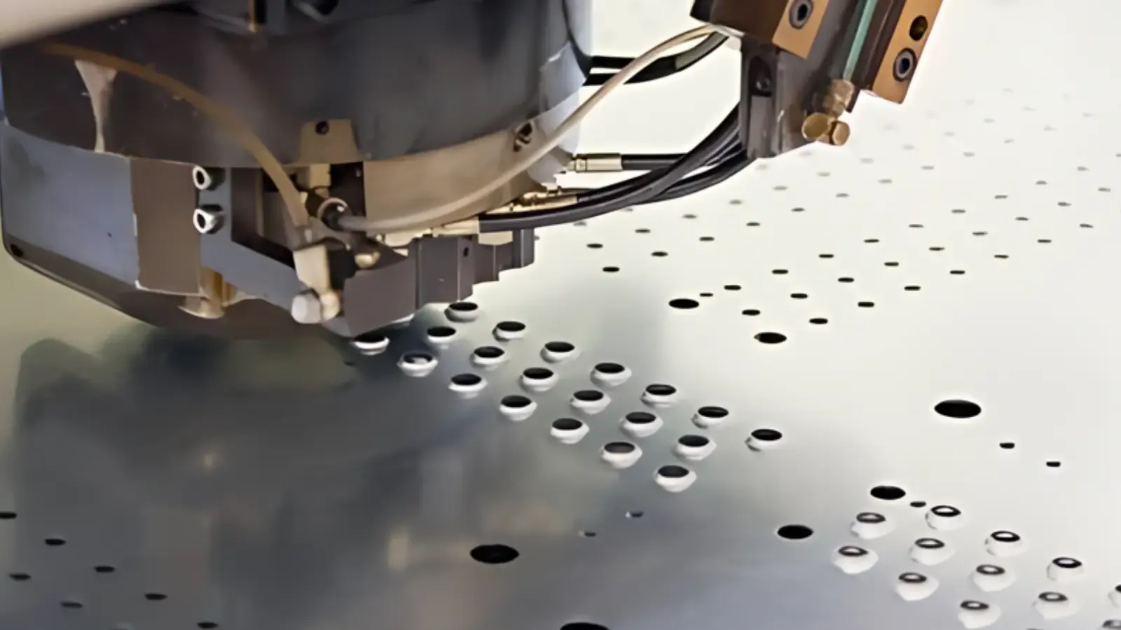 Punching holes in sheet metal