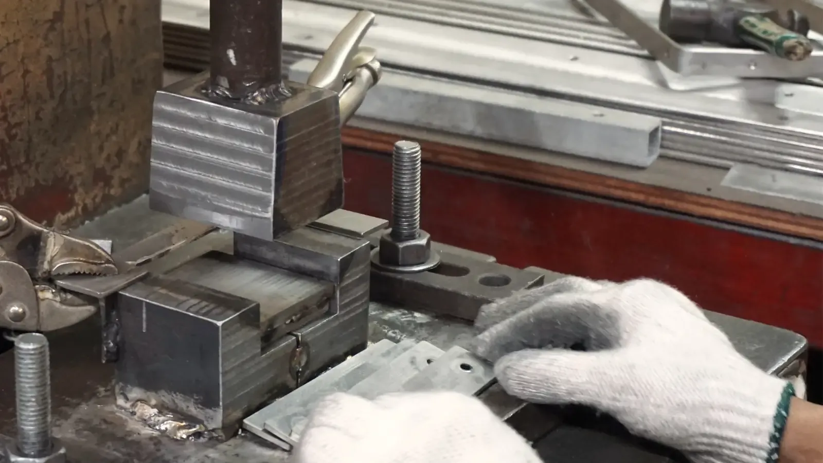 Stamping sheet metal with a press die