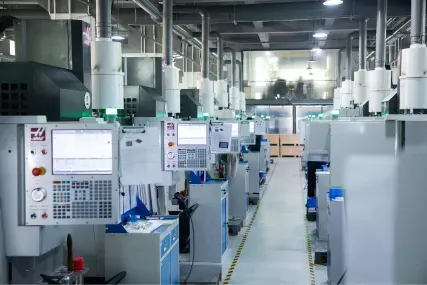 Row of CNC machines in production